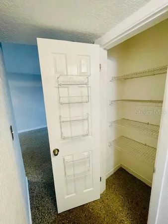 a kitchen with a stove microwave and refrigerator