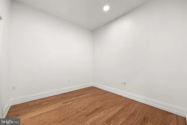 a kitchen with a stove a sink and a microwave