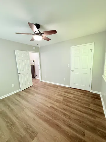 a view of an empty room and window