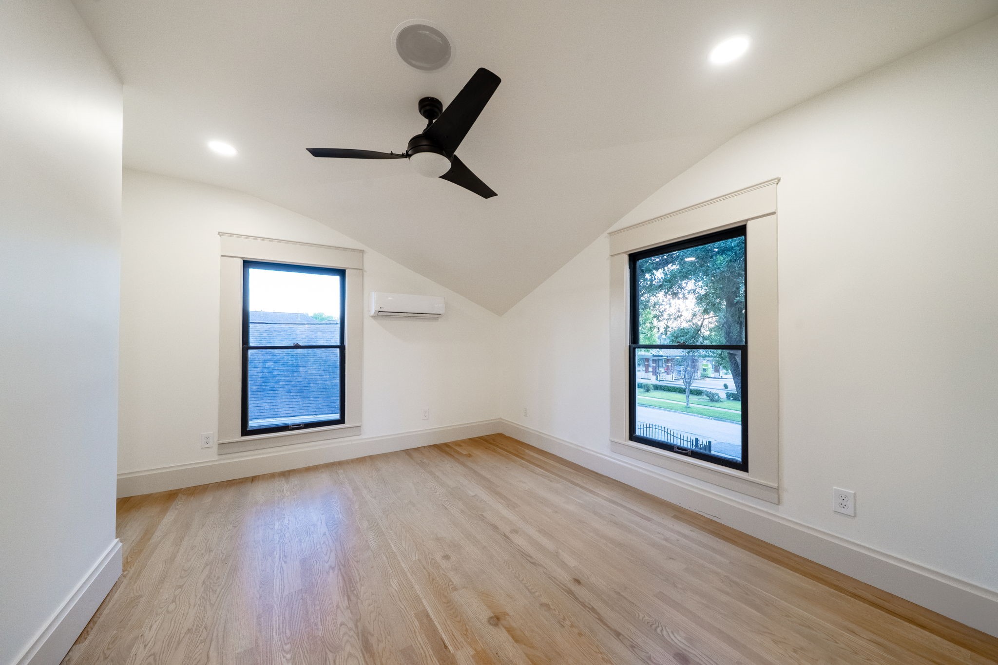 1109 Rutland Street Houston, TX 77008 - Photo 24 of 34 Bathed in natural light, this secondary bedroom offers a serene and inviting retreat. Conveniently located just steps from the bathroom, it boasts a spacious walk-in closet (not pictured) that's perfect for keeping everything organized and out of sight. A bright and functional space ready to be personalized to your style and needs!