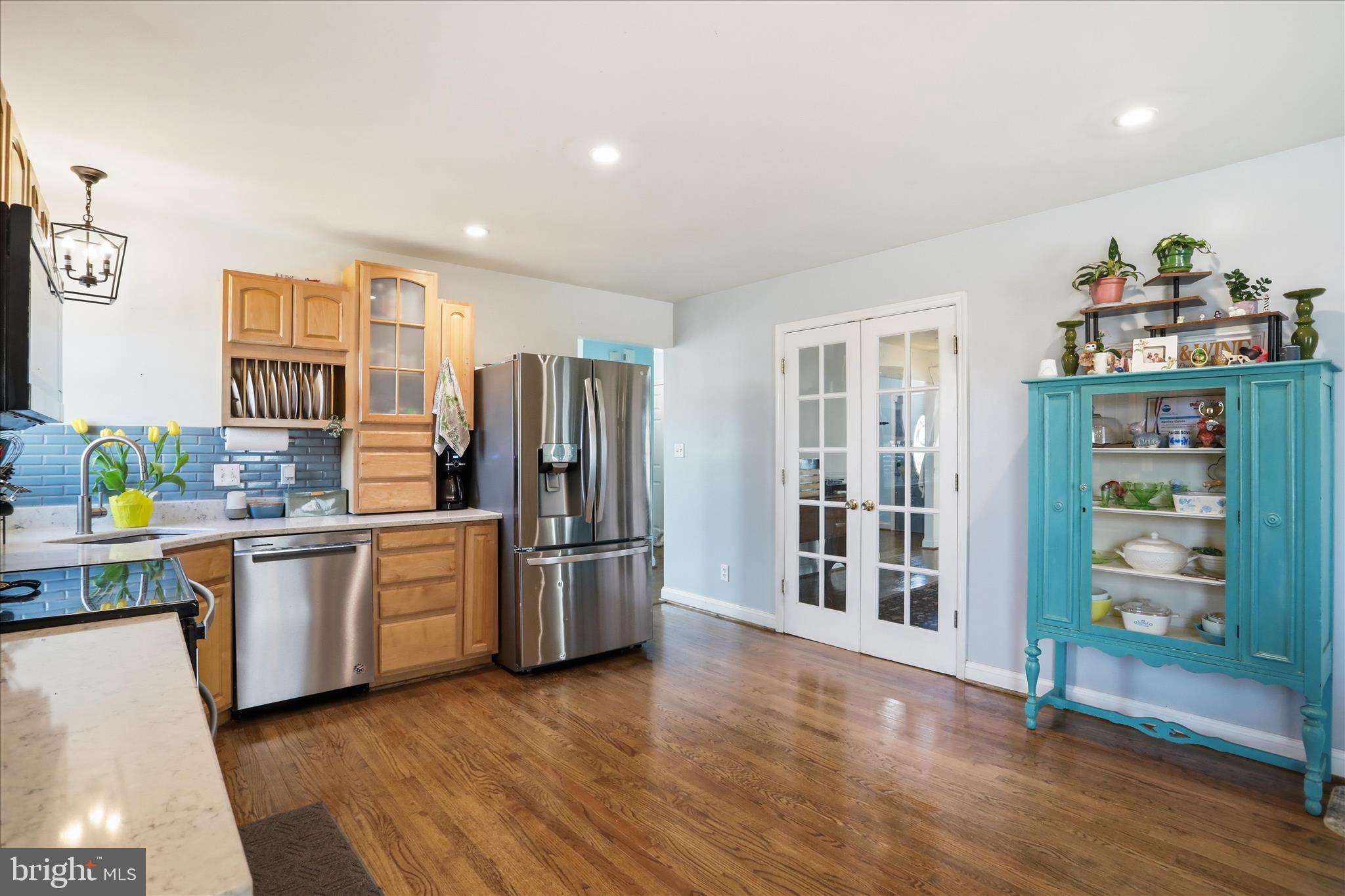 1130 Happy Ridge Drive Front Royal, VA 22630 - Photo 14 of 42 a kitchen with stainless steel appliances a refrigerator and a stove top oven
