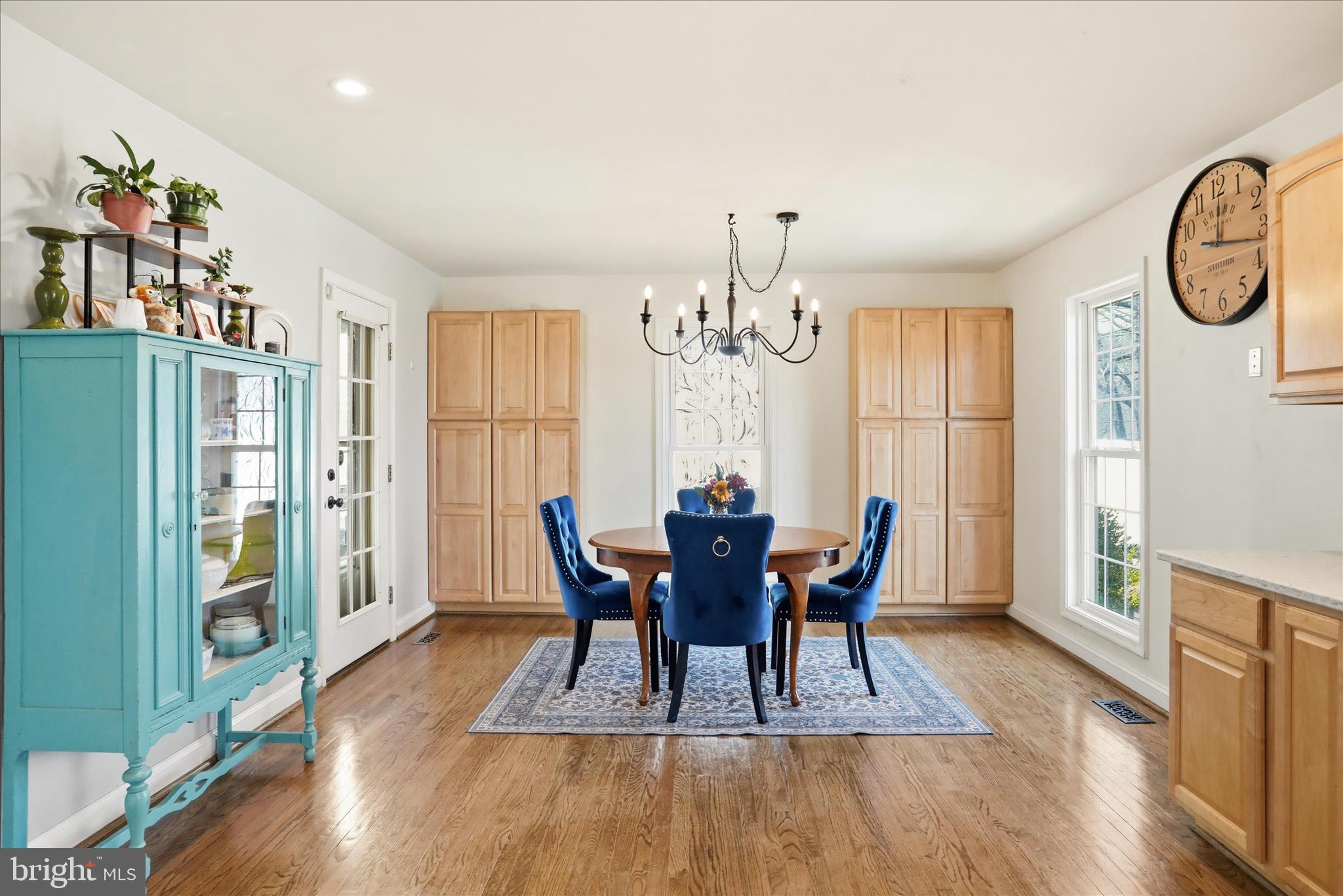 1130 Happy Ridge Drive Front Royal, VA 22630 - Photo 15 of 42 a view of a dining room with furniture window and wooden floor