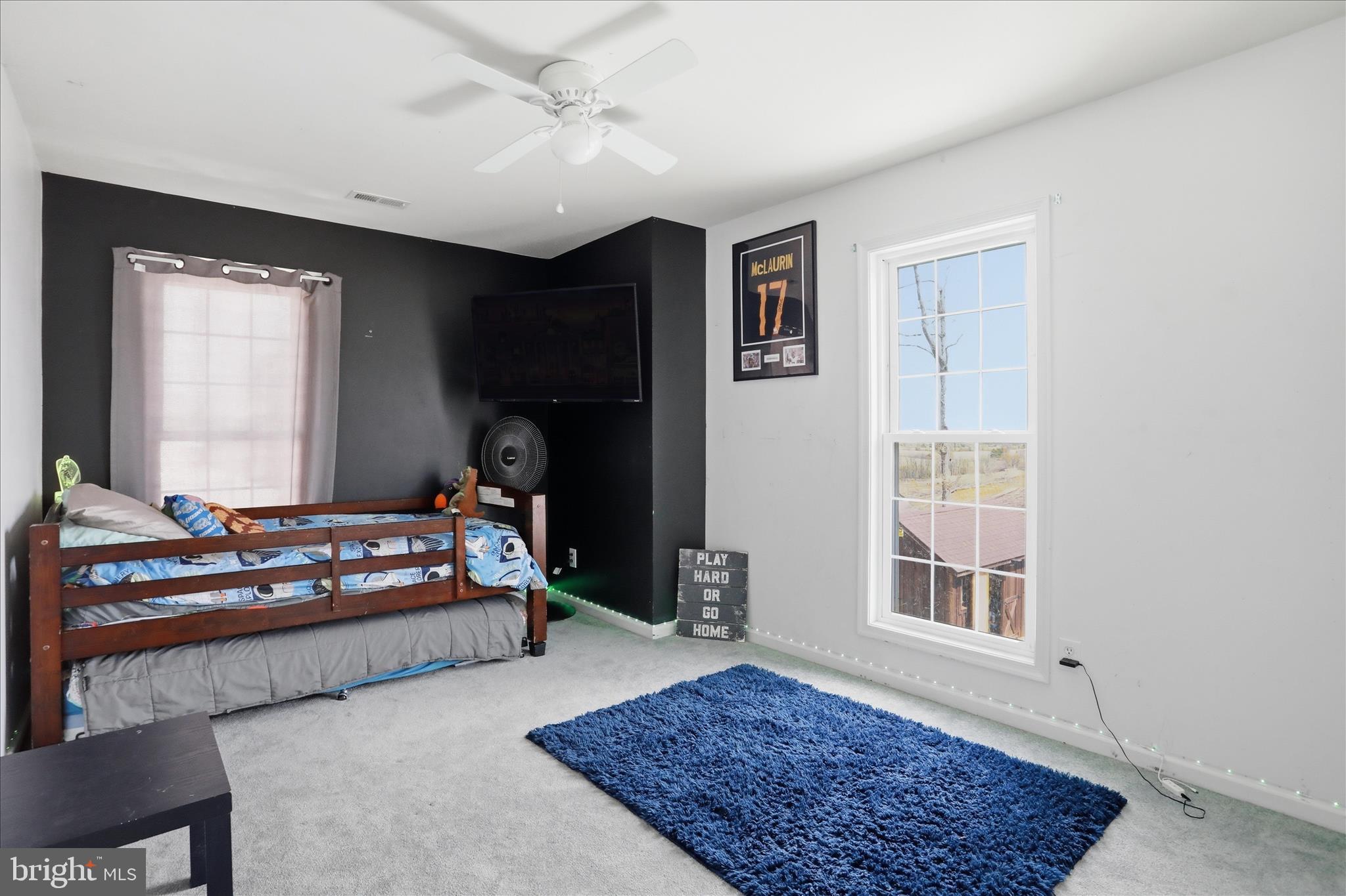 1130 Happy Ridge Drive Front Royal, VA 22630 - Photo 25 of 42 a living room with furniture rug and window