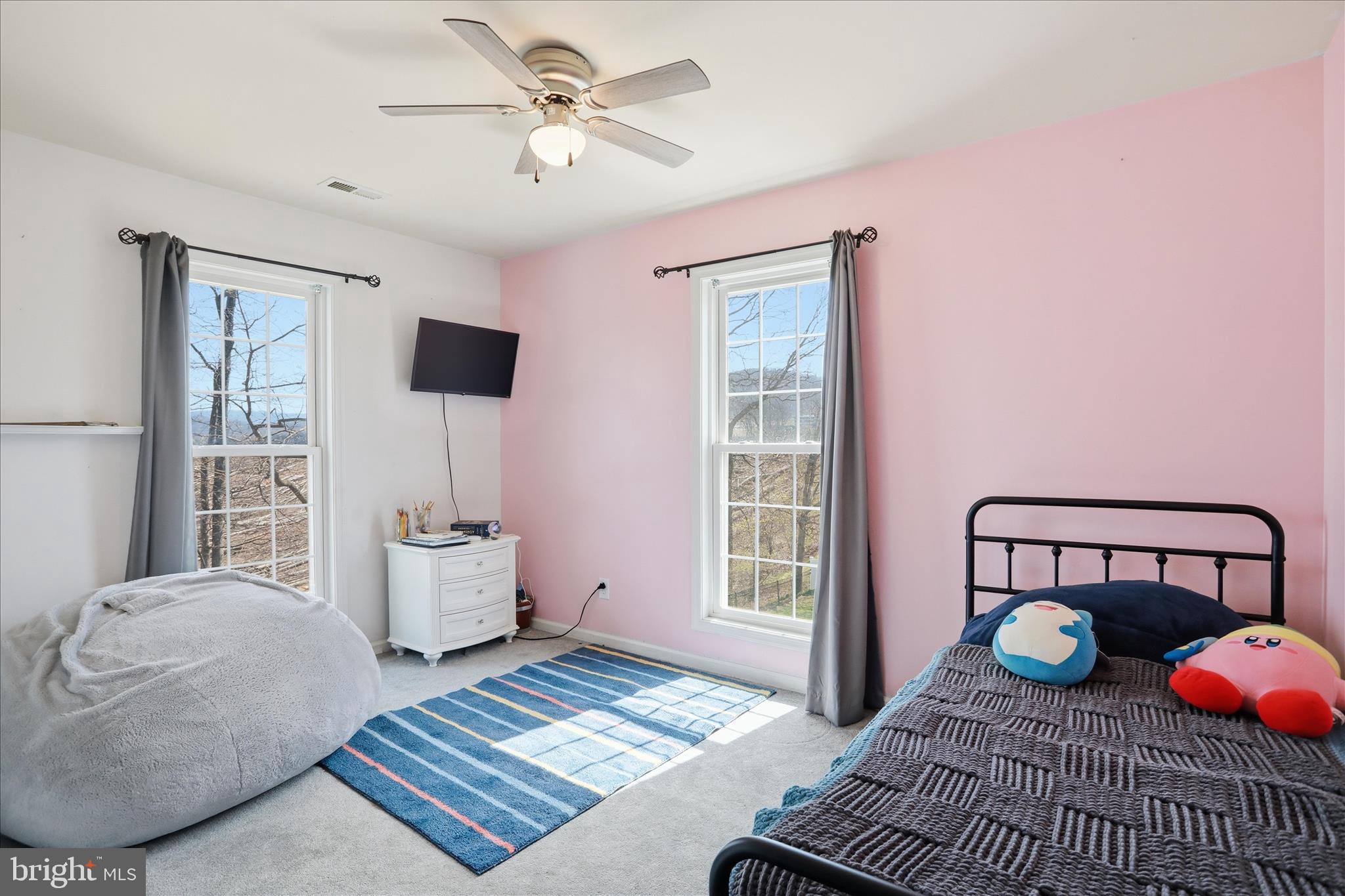 1130 Happy Ridge Drive Front Royal, VA 22630 - Photo 27 of 42 a bedroom with a bed and wooden floor