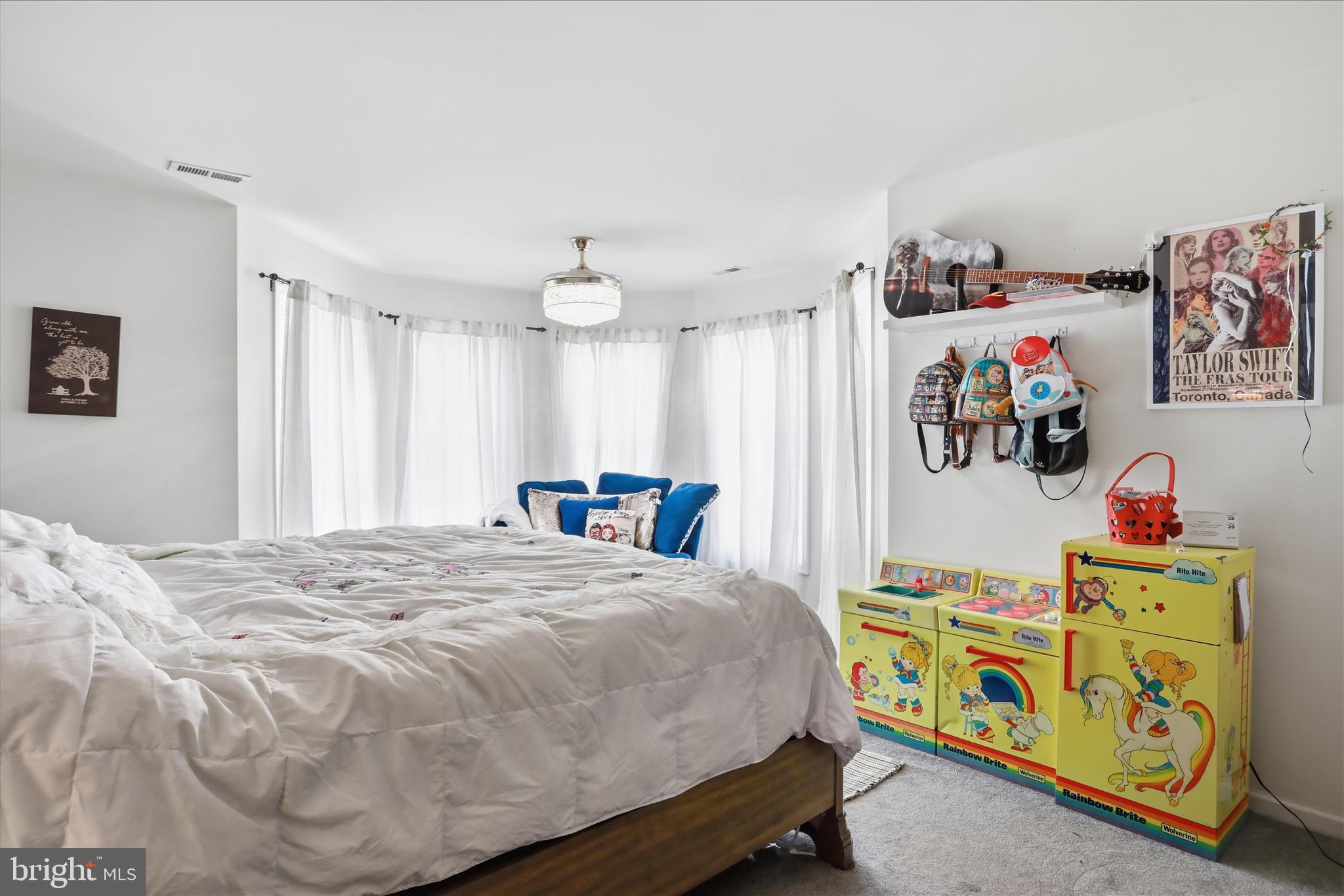 1130 Happy Ridge Drive Front Royal, VA 22630 - Photo 29 of 42 a bedroom with a bed and a chandelier