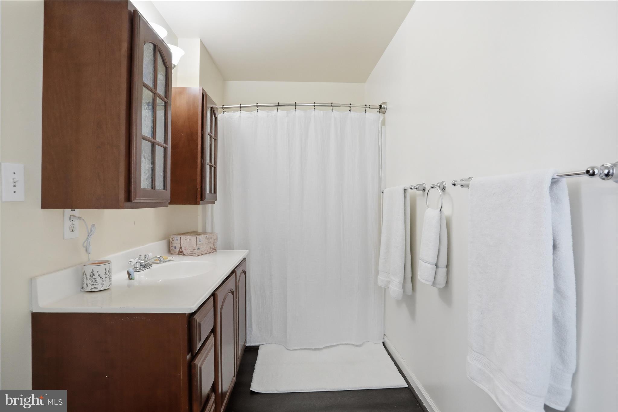 1130 Happy Ridge Drive Front Royal, VA 22630 - Photo 31 of 42 a bathroom with a sink a mirror and a shower