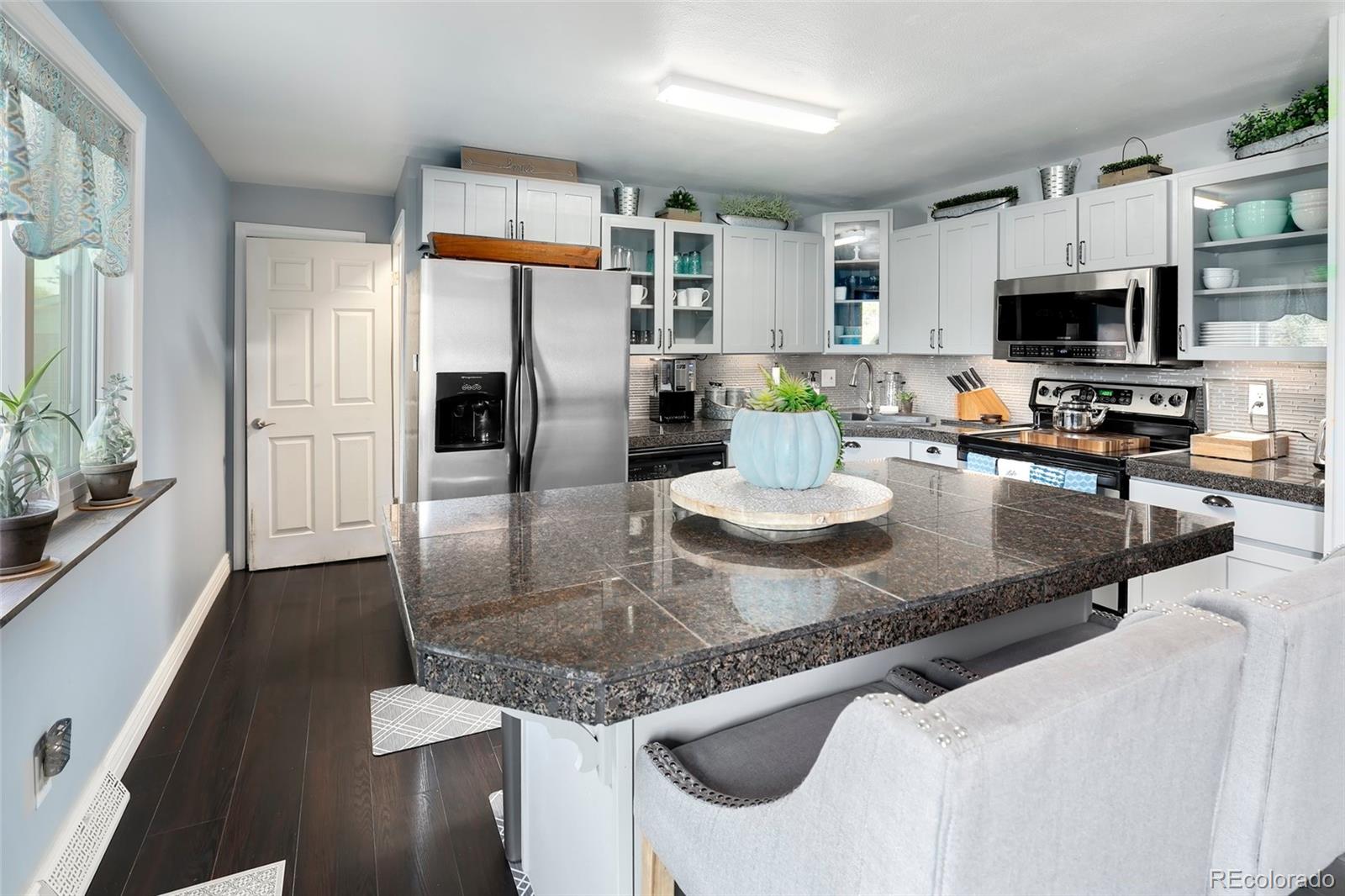 4235 West Rutgers Place Denver, CO 80236 - Photo 7 of 28 Gallery Image 7