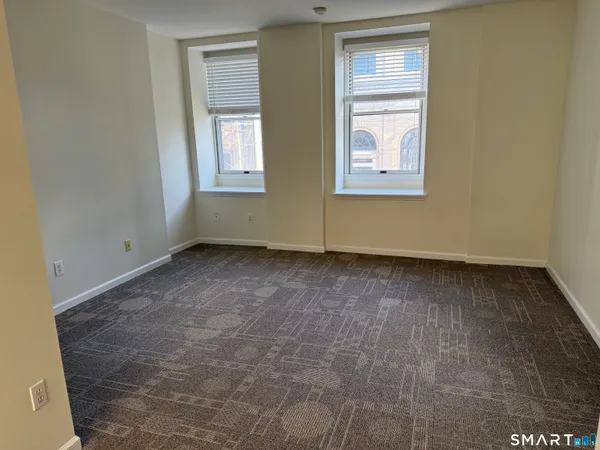 an empty room with windows