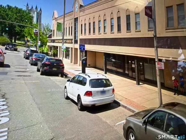 a car parked in front of a building