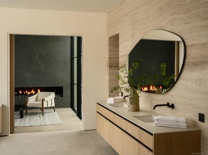 a bathroom with a sink and mirror