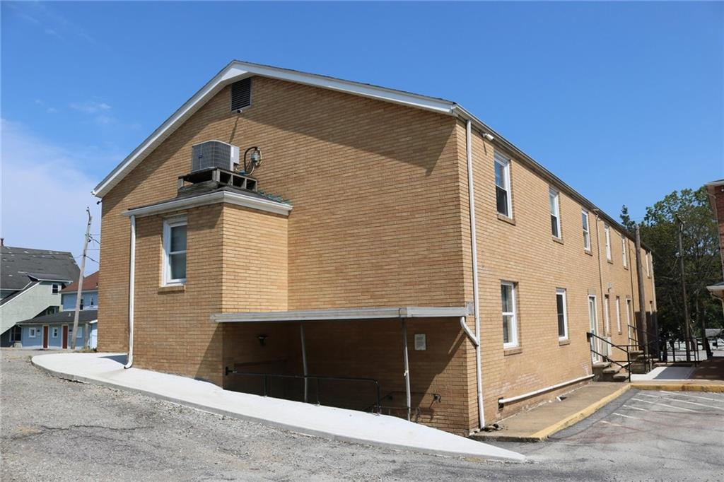 a front view of a house with a garage