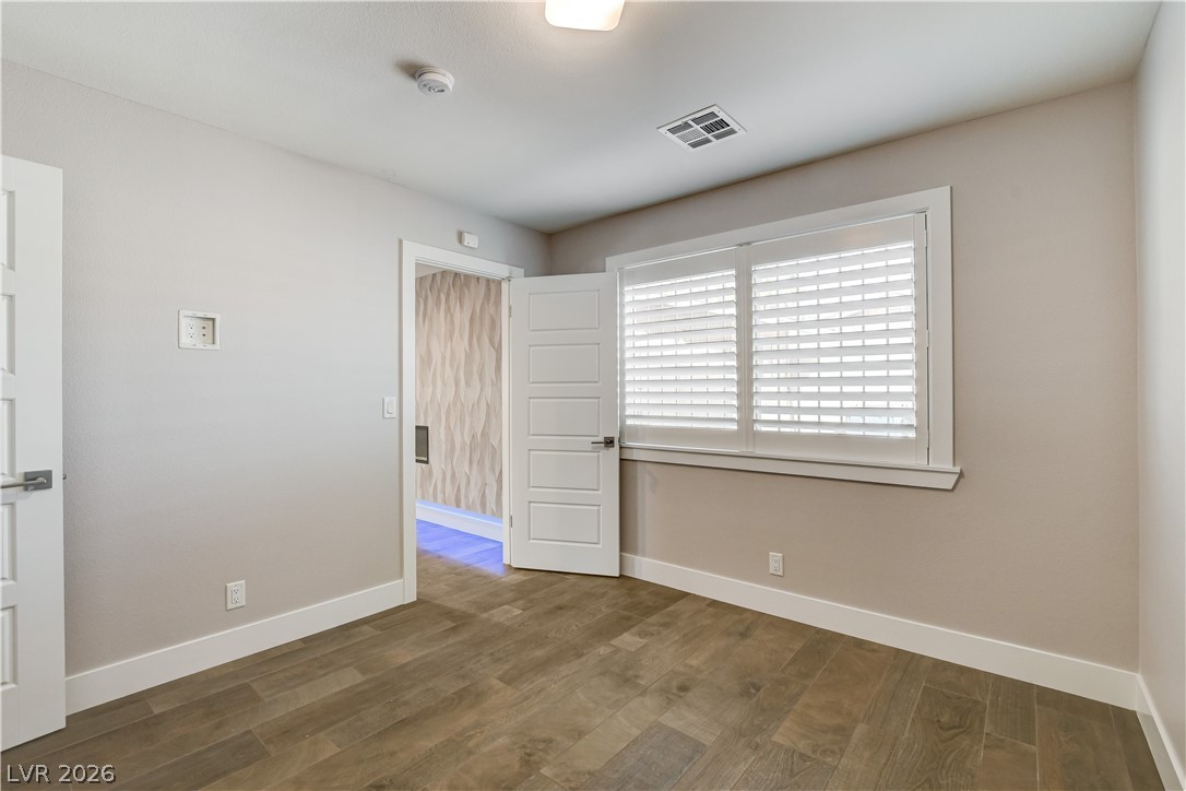 4207 Ridgecrest Drive Las Vegas, NV 89121 - Photo 22 of 27 Bedroom with upgraded tile floors