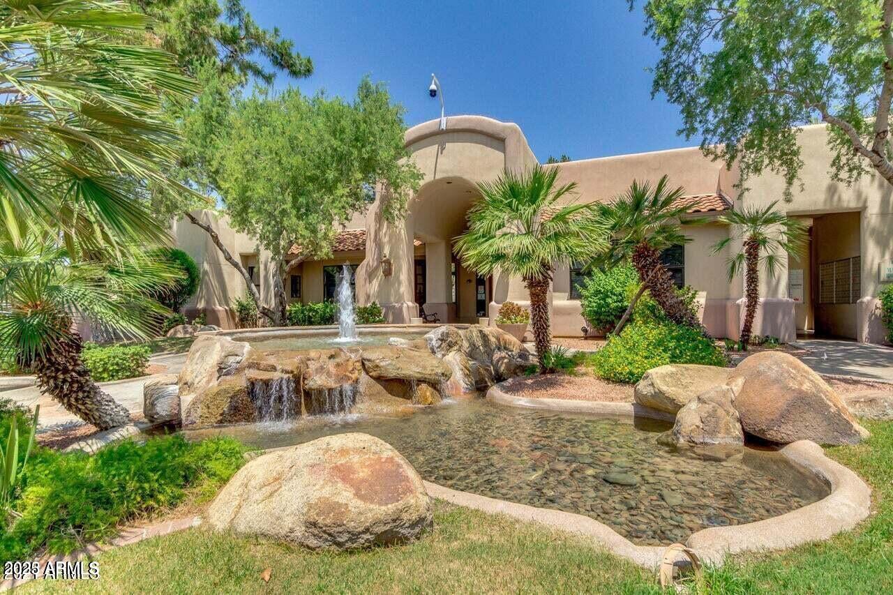 750 East Northern Avenue, Unit 1052 Phoenix, AZ 85020 - Photo 4 of 15 a view of a house with a yard