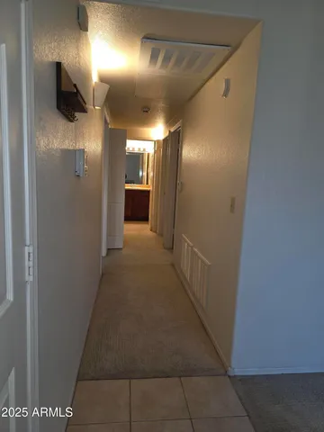 a view of hallway with a elevator