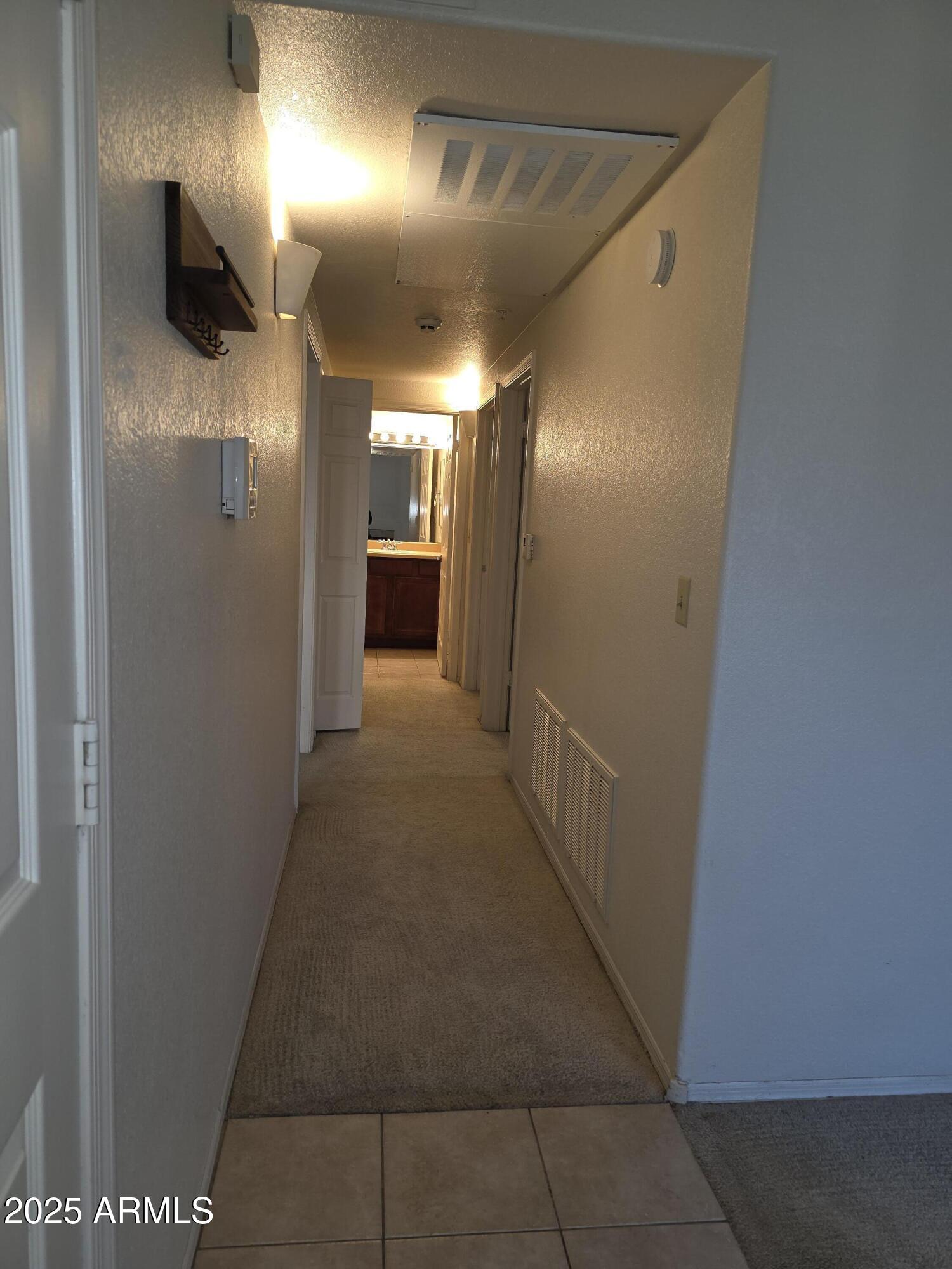 750 East Northern Avenue, Unit 1052 Phoenix, AZ 85020 - Photo 8 of 15 a view of hallway with a elevator