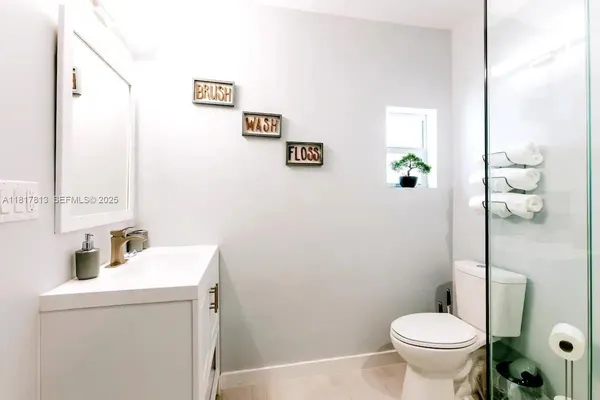 a bathroom with a sink and a toilet