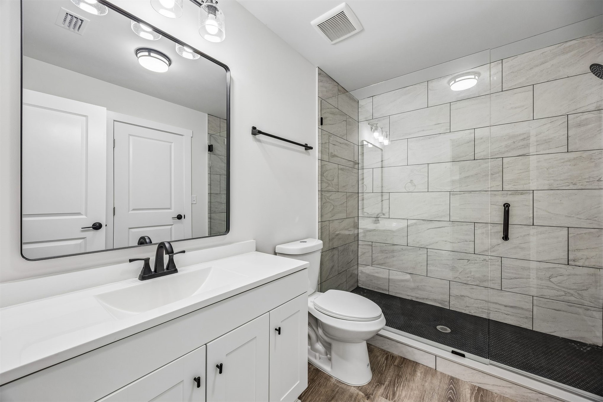 552 Sunset Road Fernandina Beach, FL 32034 - Photo 12 of 23 a bathroom with a sink a toilet and shower