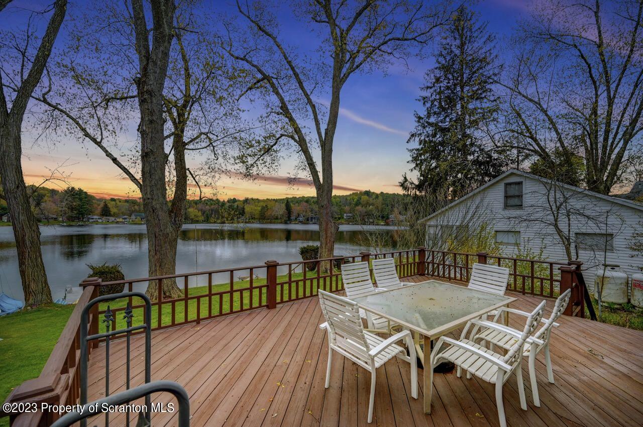 252 Baylor Road Fleetville, PA 18420 - Photo 4 of 50 a view of a patio with iron fence