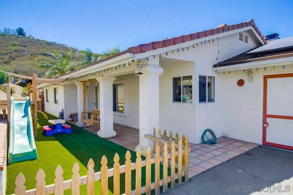 861 Peutz Valley Road Alpine, CA 91901 - Photo 22 of 42 a front view of a house with garden