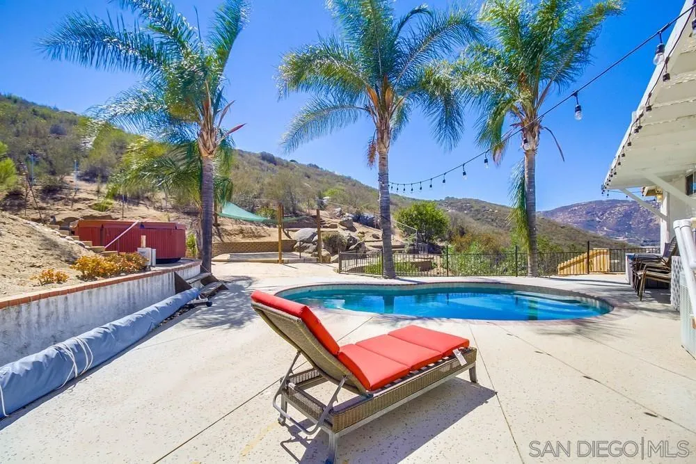 861 Peutz Valley Road Alpine, CA 91901 - Photo 25 of 42 a view of swimming pool with a lounge chairs