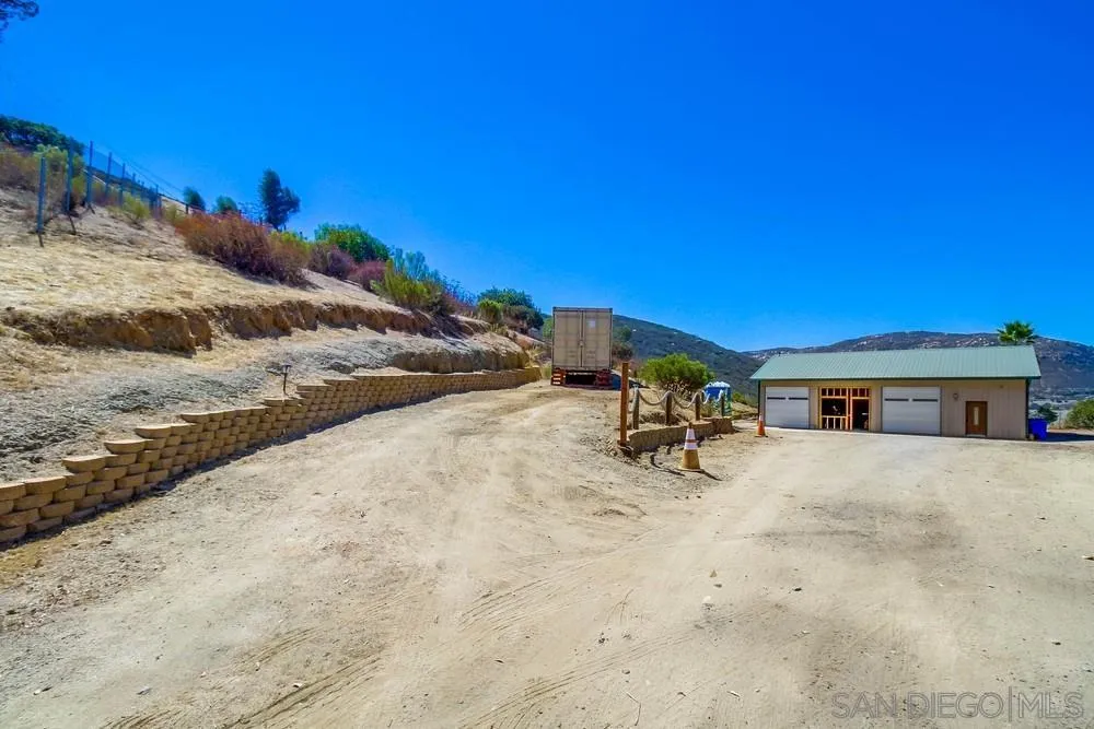 861 Peutz Valley Road Alpine, CA 91901 - Photo 31 of 42 a view of a house with a patio
