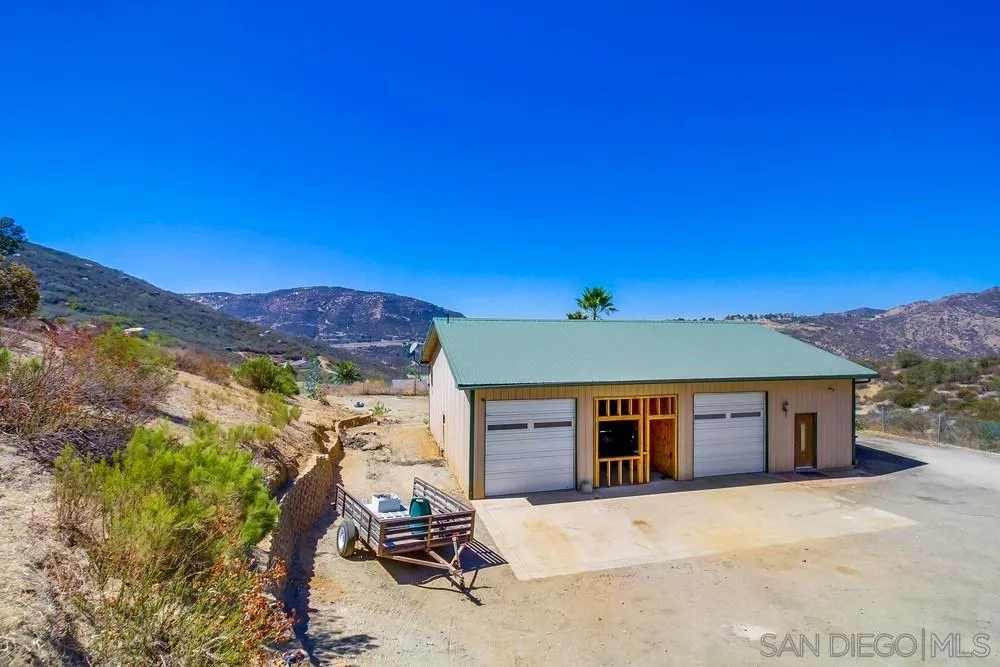 861 Peutz Valley Road Alpine, CA 91901 - Photo 32 of 42 a front view of a house with a yard
