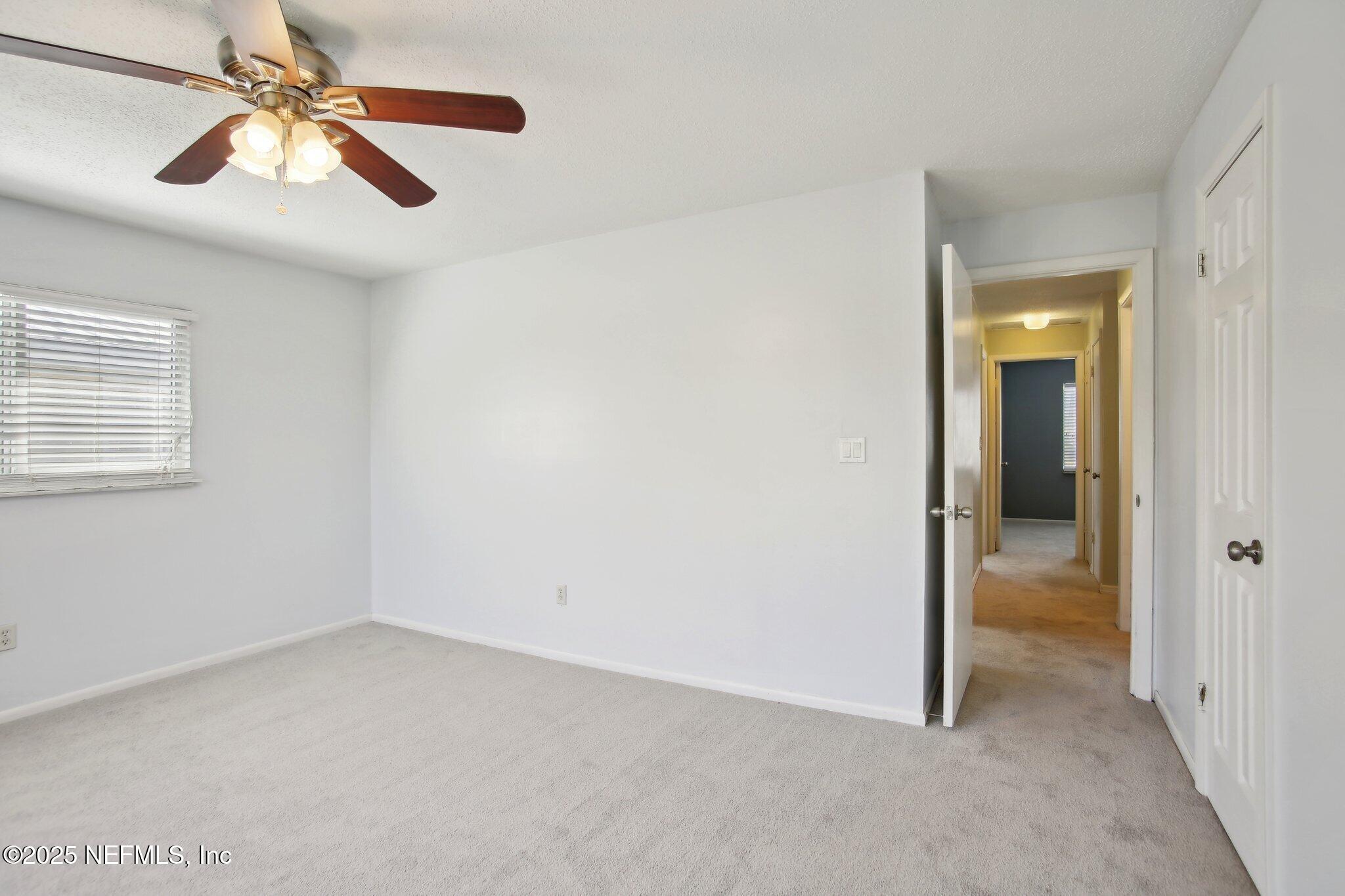 230 Lily Road St. Augustine, FL 32086 - Photo 31 of 39 a view of empty room with window