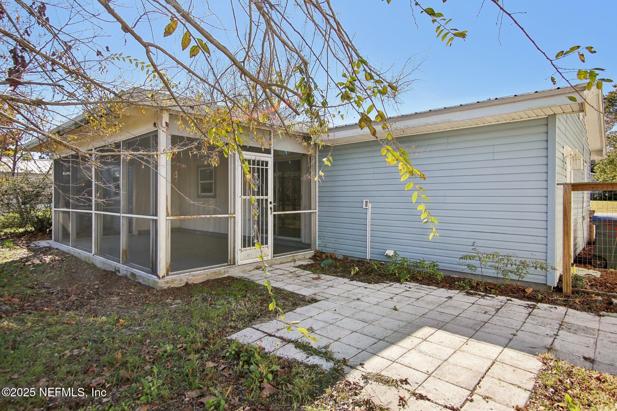 230 Lily Road St. Augustine, FL 32086 - Photo 36 of 39 a view of a entrance gate of the house