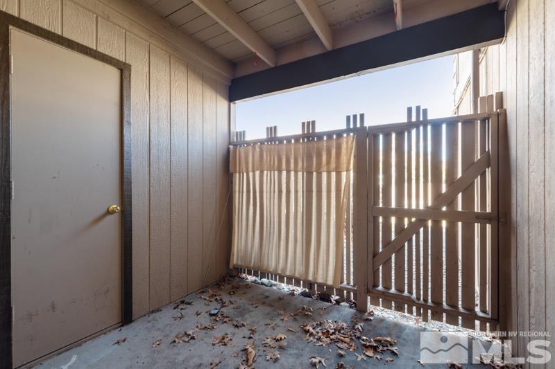 4701 Reggie Road Reno, NV 89502 - Photo 12 of 29 a view of a balcony with wooden floor
