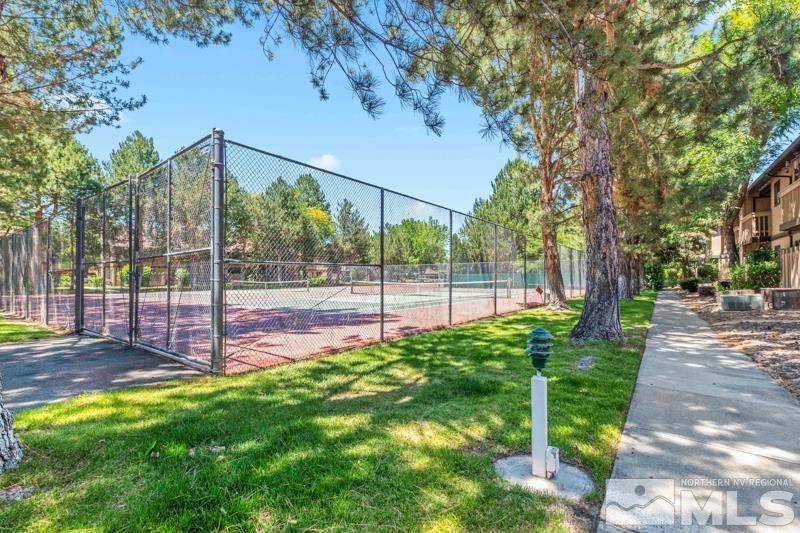 4701 Reggie Road Reno, NV 89502 - Photo 14 of 29 a view of a backyard with a garden