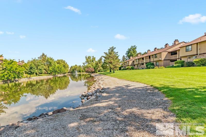 4701 Reggie Road Reno, NV 89502 - Photo 25 of 29 a view of a lake with houses in the background