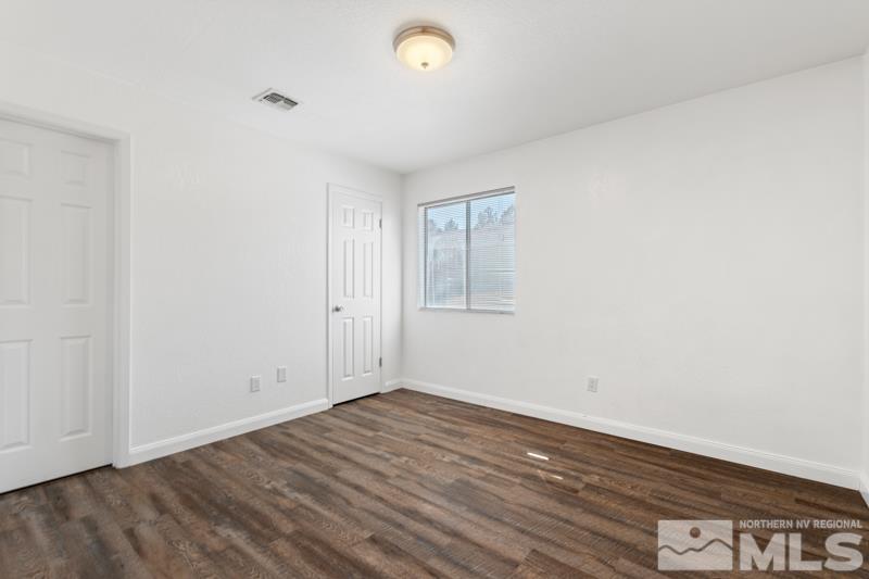 4701 Reggie Road Reno, NV 89502 - Photo 5 of 29 wooden floor in an empty room