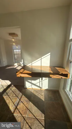 a view of a living room with a balcony