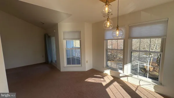 a view of a livingroom with furniture