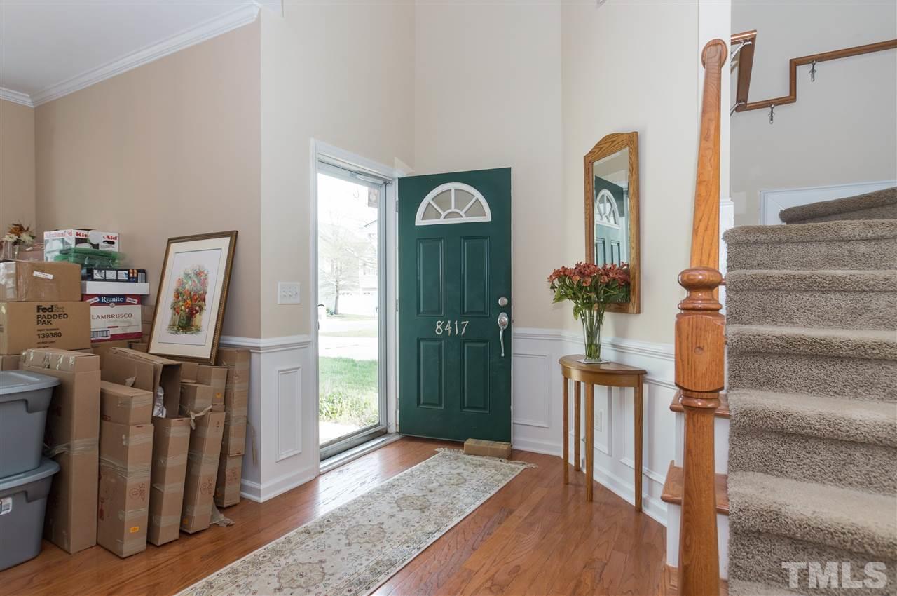 8417 Whisper Ridge Place Raleigh, NC 27613 - Photo 2 of 24 a view of an entryway with wooden floor