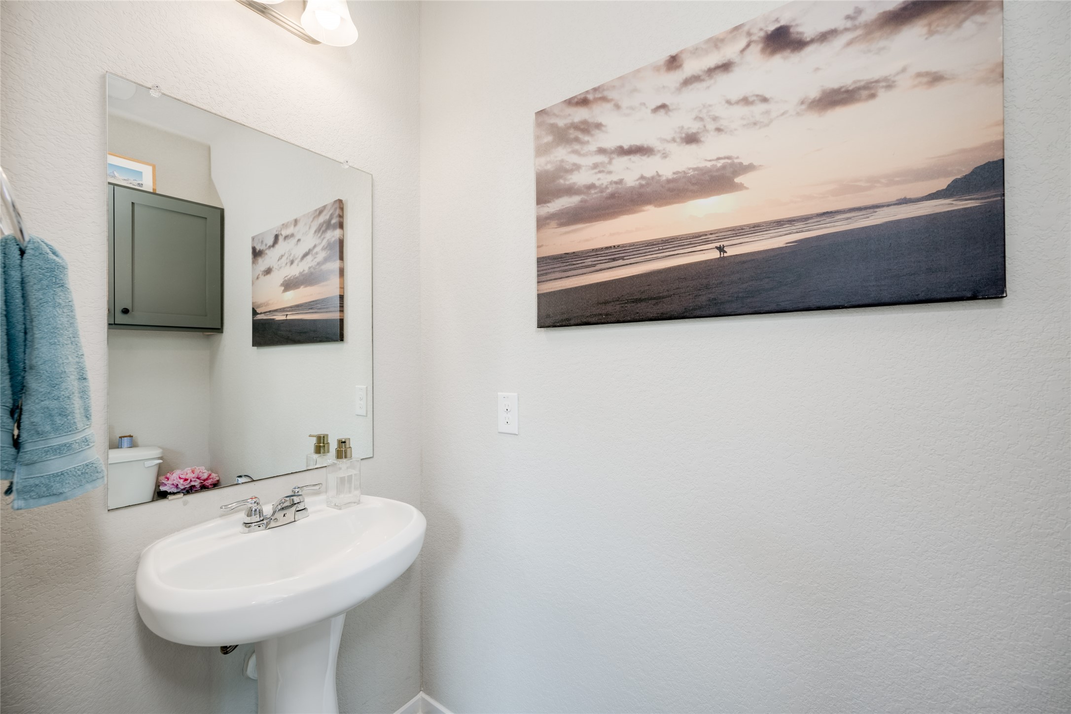 7948 Castelardo Place Round Rock, TX 78665 - Photo 26 of 32 a bathroom with a sink and a mirror