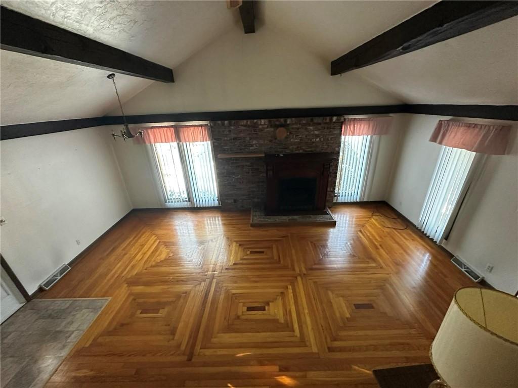 235 Hinchberger Road Butler, PA 16002 - Photo 11 of 40 a view of empty room with wooden floor