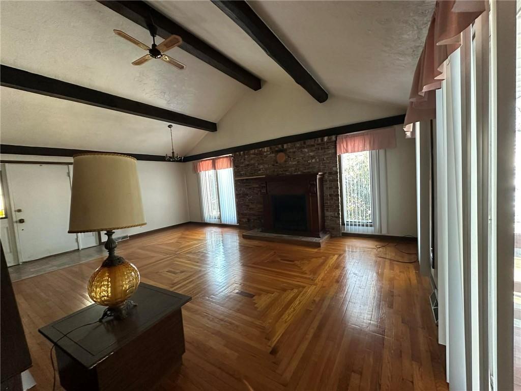 235 Hinchberger Road Butler, PA 16002 - Photo 12 of 40 a view of a livingroom with furniture wooden floor and a window