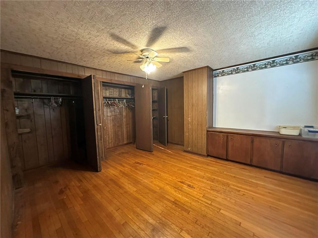 235 Hinchberger Road Butler, PA 16002 - Photo 17 of 40 a view of empty room with wooden floor