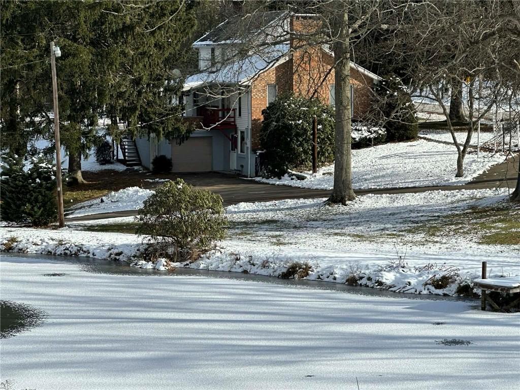 235 Hinchberger Road Butler, PA 16002 - Photo 38 of 40 a view of a house with a yard
