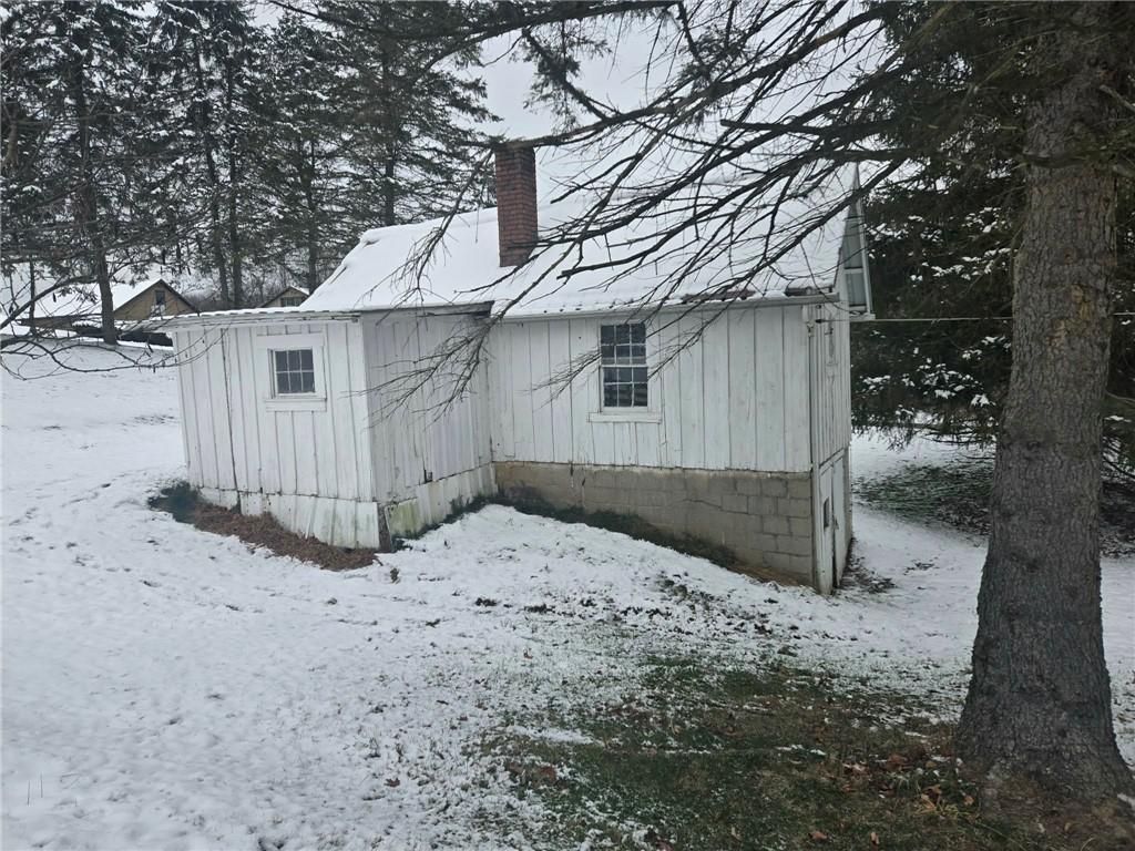 235 Hinchberger Road Butler, PA 16002 - Photo 8 of 40 a backyard of a house with a large tree