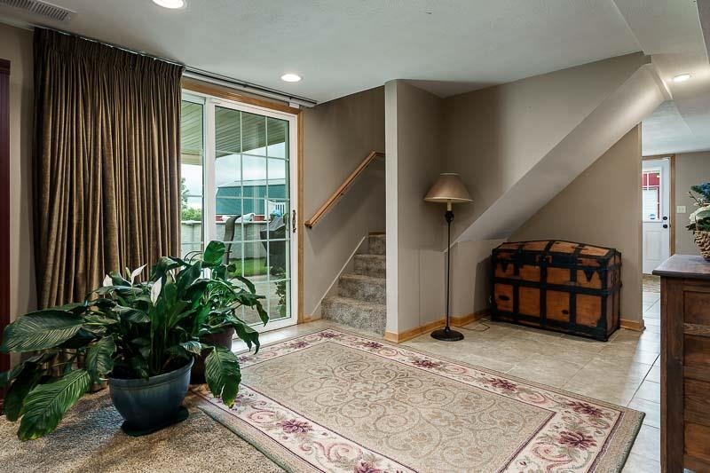 8410 Forest Preserve Road Durand, IL 61024 - Photo 18 of 37 a living room with furniture and a potted plant