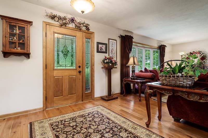 8410 Forest Preserve Road Durand, IL 61024 - Photo 2 of 37 a living room with furniture and a window