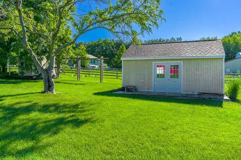 8410 Forest Preserve Road Durand, IL 61024 - Photo 27 of 37 a front view of house with yard and outdoor seating
