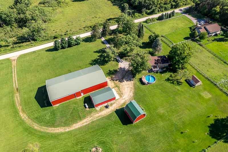8410 Forest Preserve Road Durand, IL 61024 - Photo 33 of 37 an aerial view of residential house with outdoor space and pool