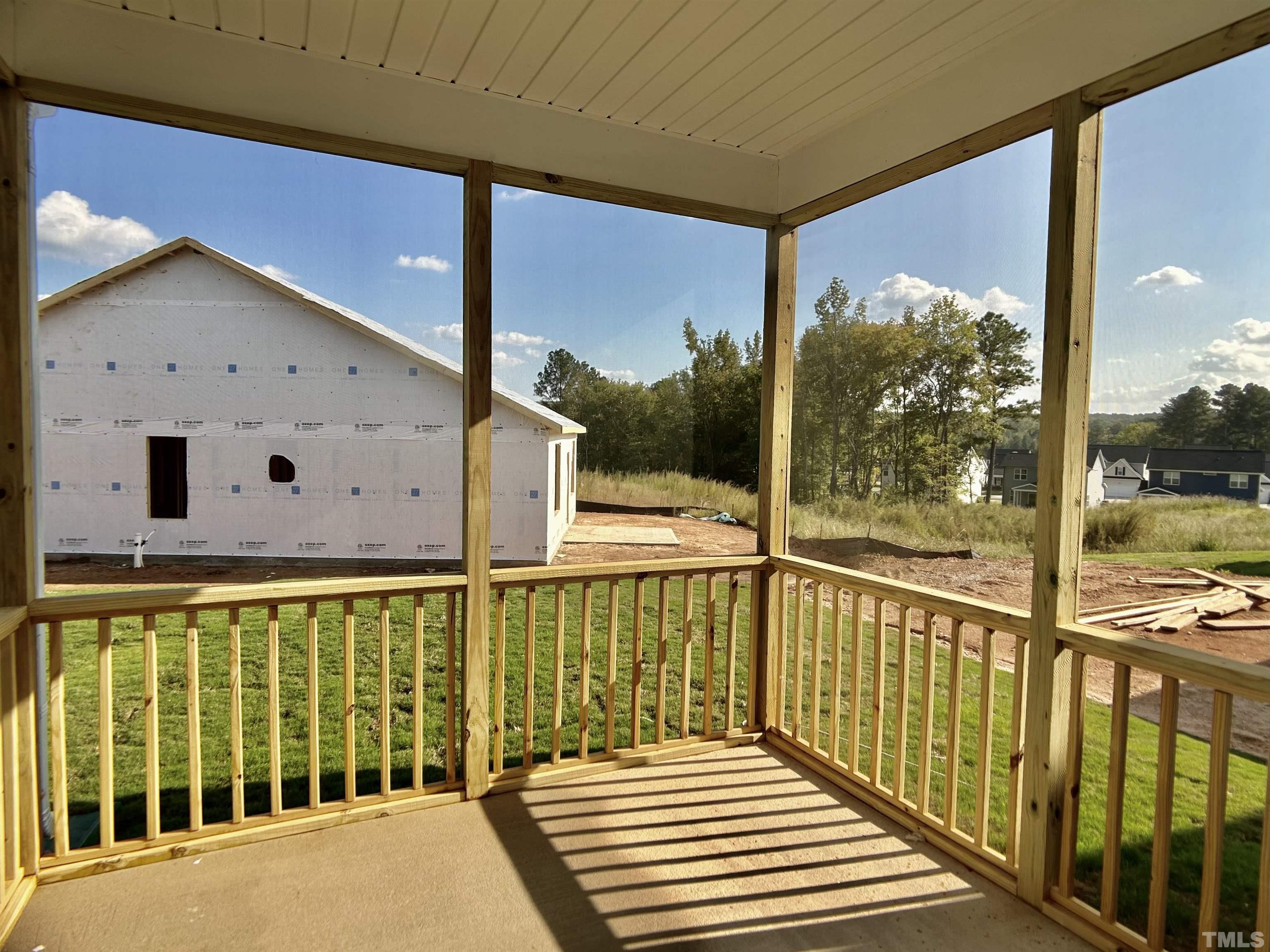150 Greenview Street Clayton, NC 27520 - Photo 17 of 23 a view of a balcony with wooden floor and fence