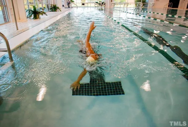 a vase of flowers sitting on a table