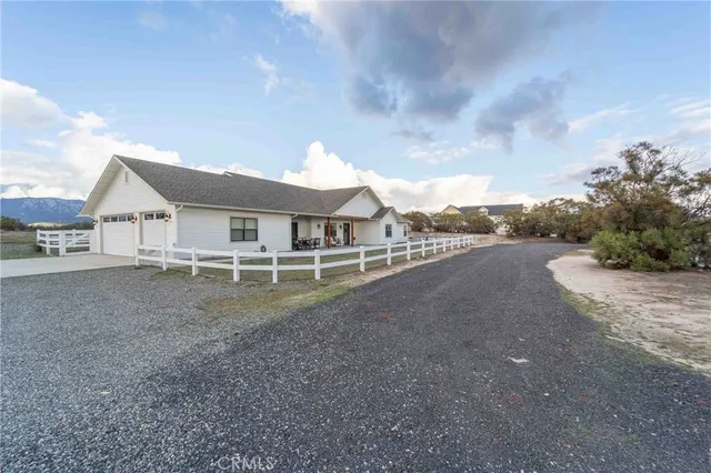 a view of lake with green space
