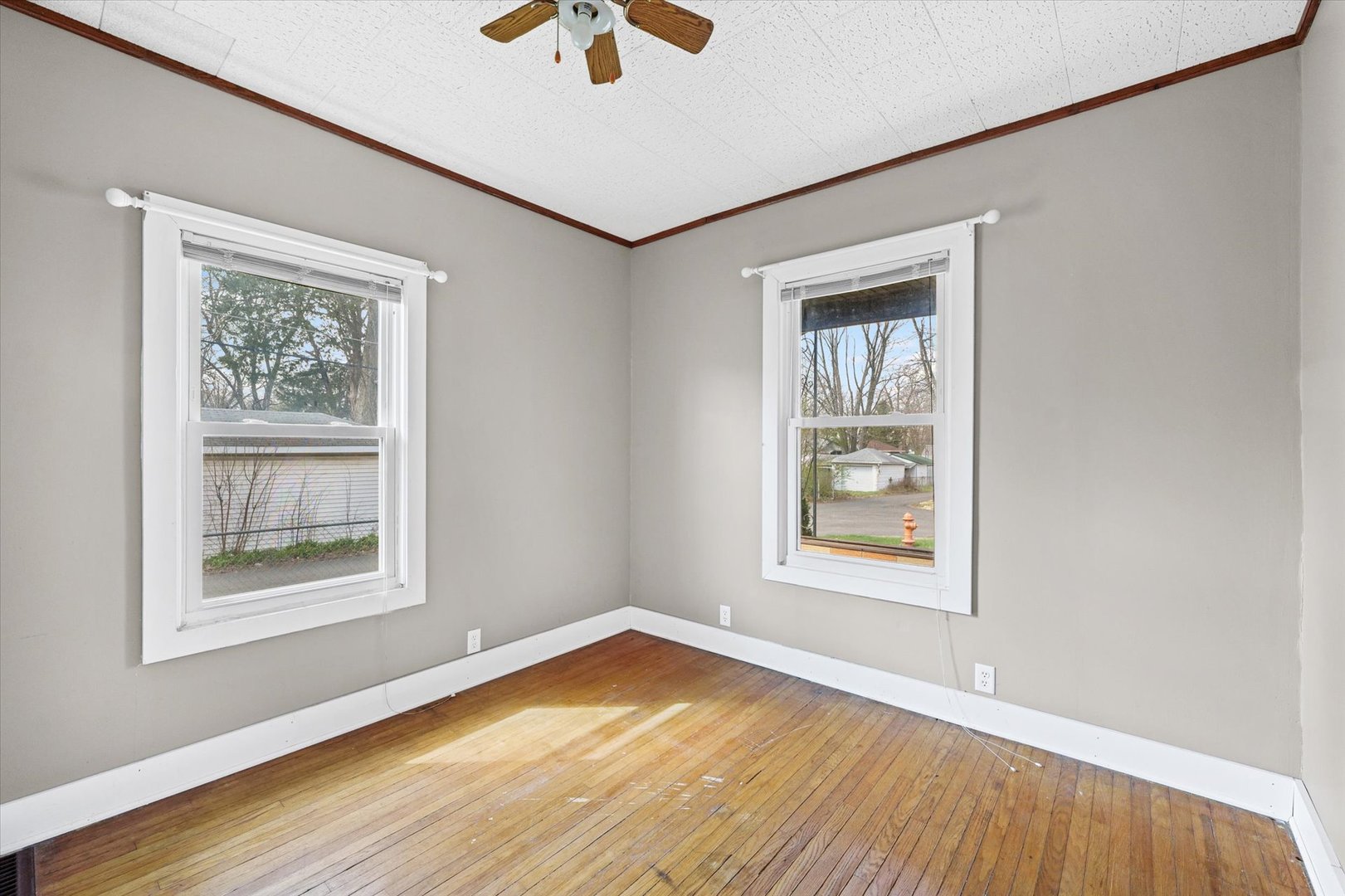 1311 West Hill Street Champaign, IL 61821 - Photo 18 of 27 an empty room with a window