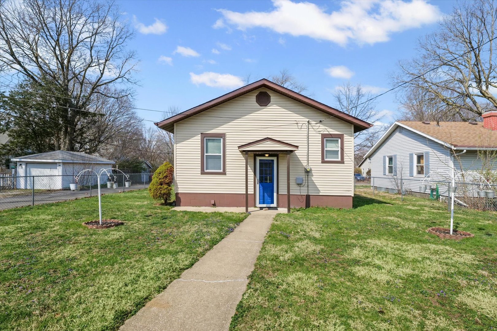 1311 West Hill Street Champaign, IL 61821 - Photo 24 of 27 a view of front of house with a yard